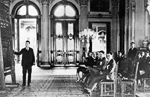 Adopted: Turkish officials and officers during a writing class
