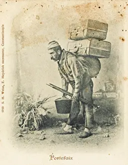 Hatbox: Turkish porter carrying two suitcases