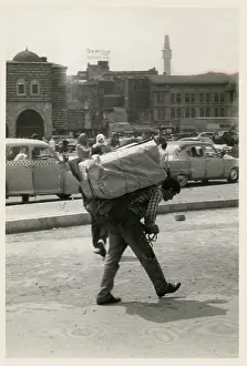 Stooped: Turkish Porter with a heavy load - Istanbul, Turkey