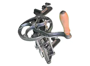 Peels: Turntable apple peeler with wooden handle