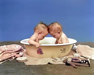 Bathtubs: Two Twin Babies in Bath Tub Looking Down