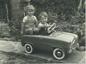 Jan21: Twins in a toy car