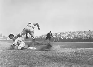Baseman: Ty Cobb steals third base and slides into