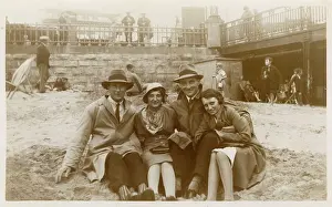 Grenville Collins / Tom Gillmor Collection: Typical British Summer - Wrapped up warm on the beach