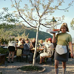 Waitresses: Typical viennese wine tavern. Photograph by