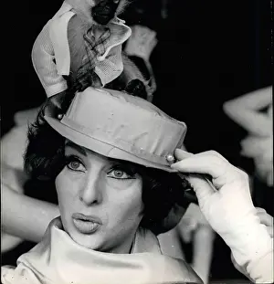 Remus: Uncle Remus monkey on dancer Vicky Gray's hat