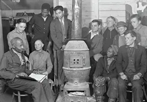 Unemployment: Unemployed men attending meeting of the Workers
