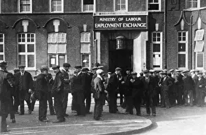 Unemployed men in front of the employment office in London