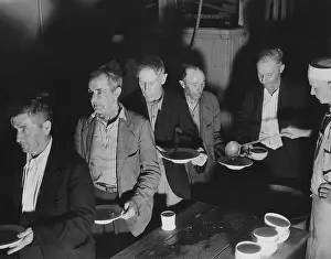 Breadline: Unemployed men at soup kitchen