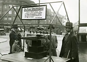Prospective: Unemployed people display an airplane model