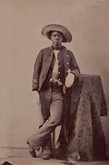 Revolvers: An unidentified Buffalo Soldier posing with