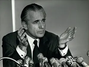 Microphones: Unidentified man with microphones