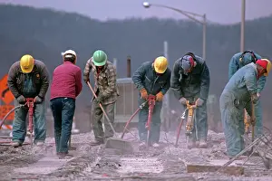 Pat001: Unidentified workers using compressed air jack