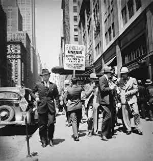Unfair: Union men picketing Macy's department store. ?
