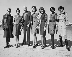 Stewardesses: United Airlines stewardesses modeling their ?