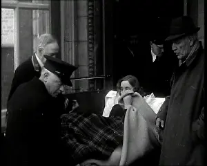 Mitford: Unity Mitford Lying on a Stretcher and Being