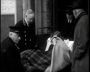 Mitford: Unity Mitford Lying on a Stretcher and Covering