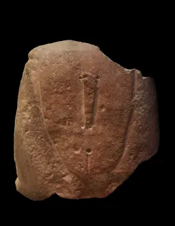 Megalithic: Upper part of a statue menhir made of globigerina