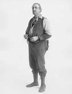 Offended: Upset man looking up against white background