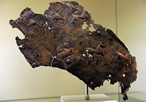 Urartian: Urartu civilization. Remains probably of a decorated armor