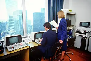 Keyboards: Urban Office with Early Hardware Man Seated at