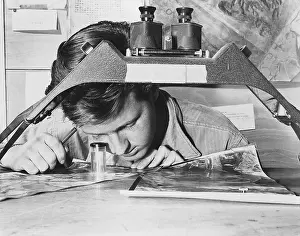 Air Force: U.S. Air Force Sergeant studies an reconnaissance