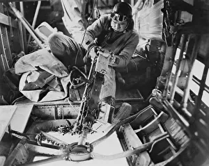 Lcgr1404: U.S. Army Air Force gunner operating a machine