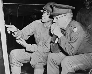 Fieldwork: U.S. Army Generals looking at a map, circa 1942