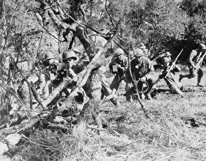 Defending: U.S. Army machine gun crew protecting advancing