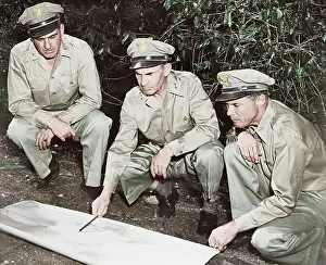 Fieldwork: U.S. Army members reviewing a map in the South