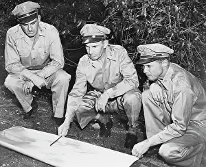 Fieldwork: U.S. Army members reviewing a map in the South