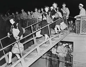 Ramp: U.S. Army nurses on the gangplank of a troop