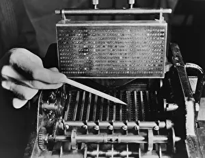 Computation: U.S. Bureau of the Census computer operator pointing