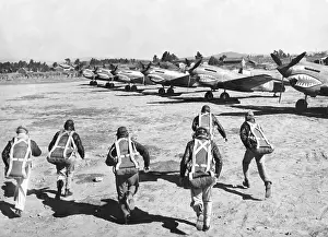 Urgency: U.S. Flying Tiger pilots run to their fighter