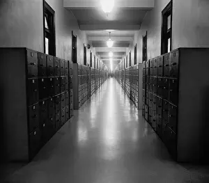 Analog: U.S. Government hallway lined with file cabinets