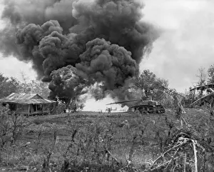 Forager: U.S. Marine flame-throwing tank attacks a Japanese