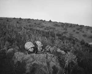 Foxholes: U.S. Marine machine gun crew dug in for the night