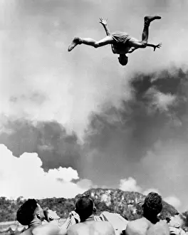 Leathernecks: A U.S. Marine private receives a tossing in a