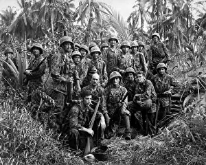 Cartwheel: U.S. Marine Raiders in front of a dugout on Cape