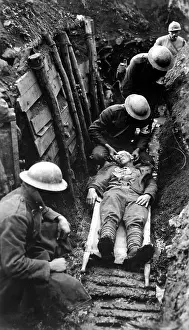 Litters: U.S. Marine receiving first aid in the trenches
