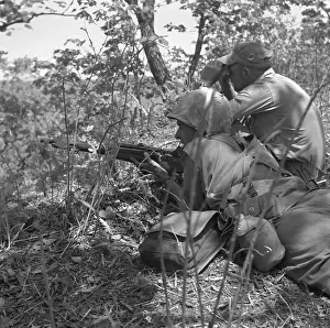Spotter: U.S. Marine sniper and spotter work together in