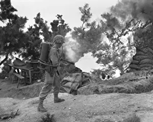 Lcgr1408: U.S. Marine uses flame thrower to burn out enemy