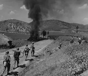 Flamethrowers: U.S. Marines advancing in the Naktong River Battle