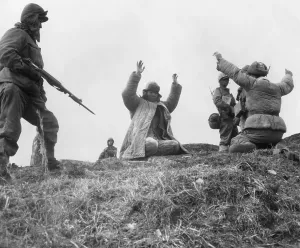 Hands Up: U.S. Marines capture Chinese Communists during Operation