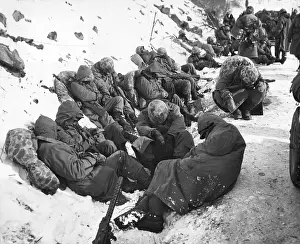 East Asia: U.S. Marines catch a few moments rest during their