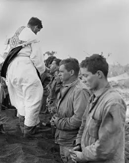 Lcgr1312: U.S. Marines and a Chaplain celebrate Catholic