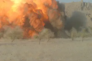 Helmand: U.S. Marines clear mines in a orchard at ?