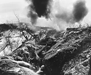 Entrenched: U.S. Marines take cover in a deep trench as Red
