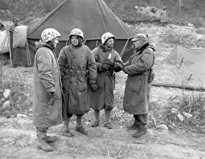Seifert: U.S. Marines are decorated in a brief front lines