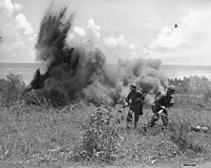 Forager: U.S. Marines just after throwing a TNT charge